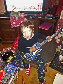 Photo: A budding Rock Star and the other thinks he's one already!  Hey! I'm here for lessons. (tho my guitar has been gathering dust for years).