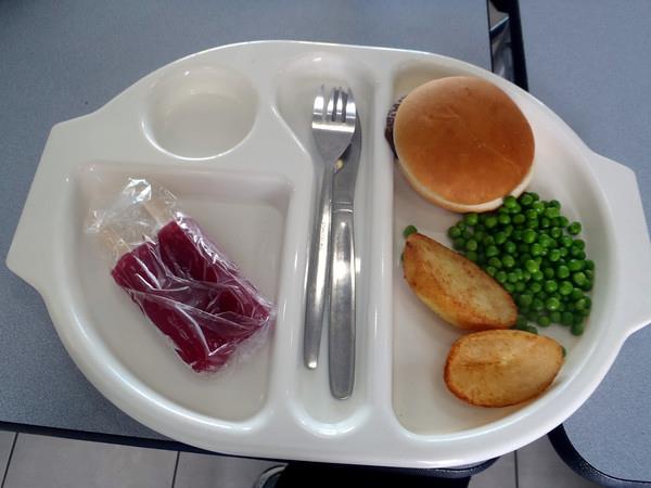 Photo: Martha says: "Today's meal was delicious. It was a beef burger, roast potatoes and peas. I didn't want any salad today".  http://neverseconds.blogspot.co.uk/2012/06/i-met-two-ladies-from-marys-meals-who.html  No wonder our kids are overweight and unhealthy ! But how can we make healthier food that tastes like beefburger and potatoes? I myself might eat more salad if it were covered in lots of gravy - but they  don't exactly go together. Has anyone tried it? http://www.bbc.co.uk/news/uk-scotland-glasgow-west-18484437