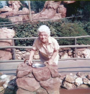 Mums caption  Its-thirsty-work-touring-Disneyland Feb 1986